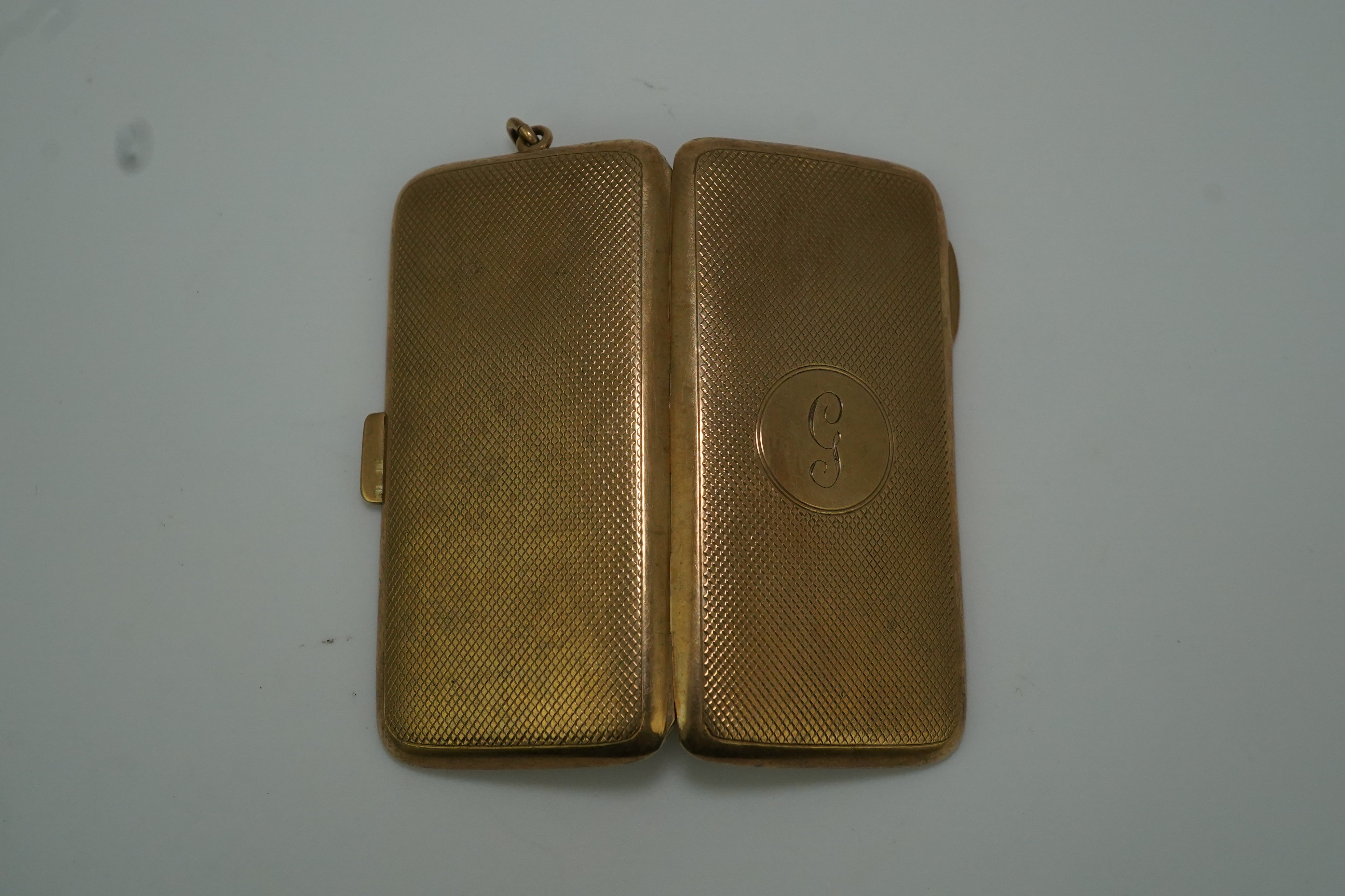 A George V 9ct gold cigarette case, circa 1919